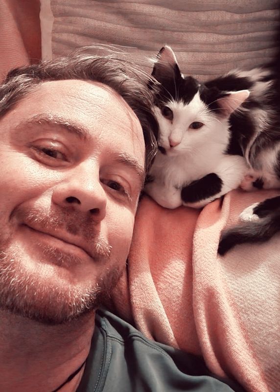 Finnick relaxing in his forever home